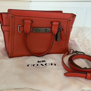 Orange Coach bag